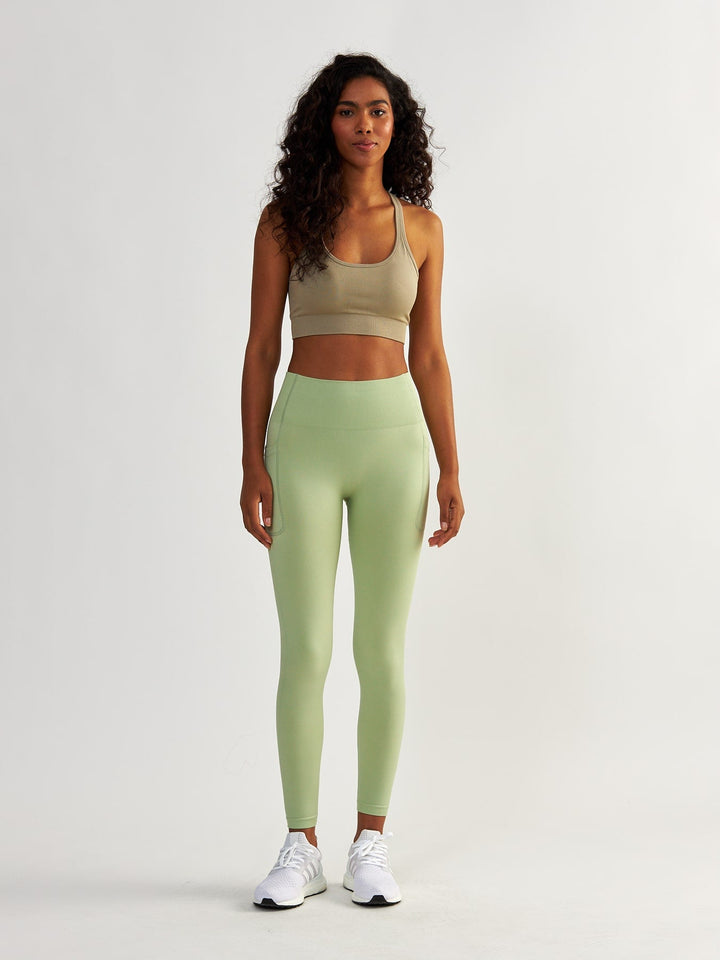 Pistaziengrüne Leggings mit Taschen - Lift Me Up