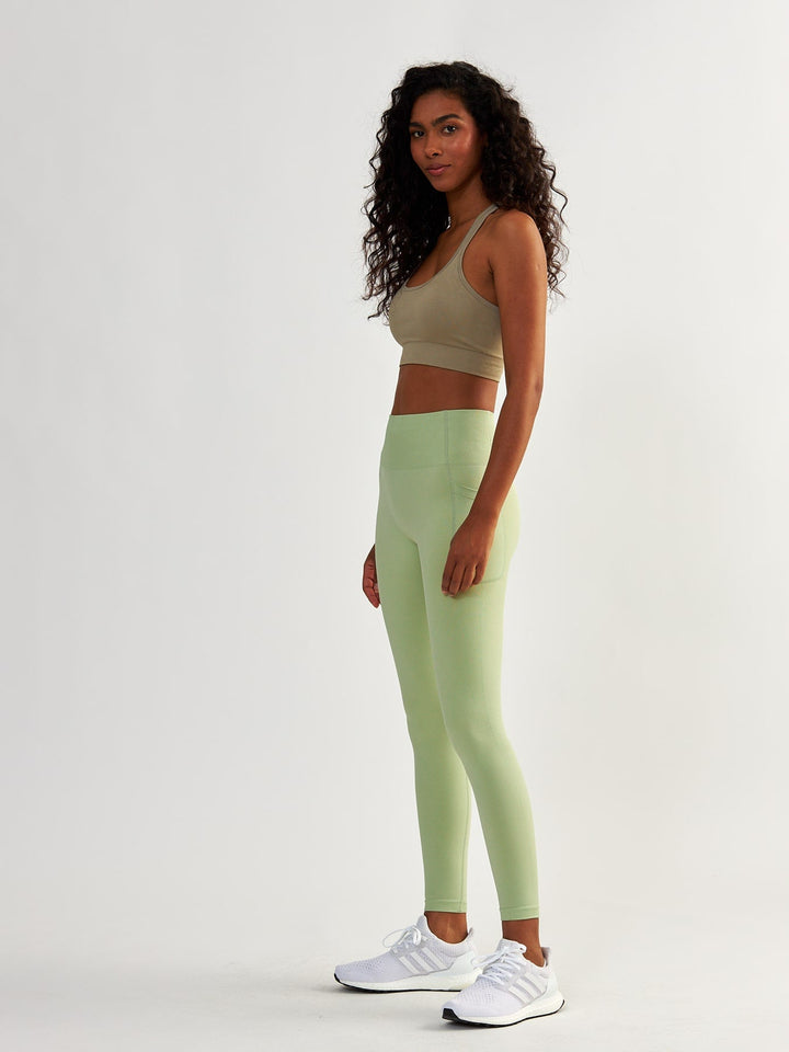 Pistaziengrüne Leggings mit Taschen - Lift Me Up